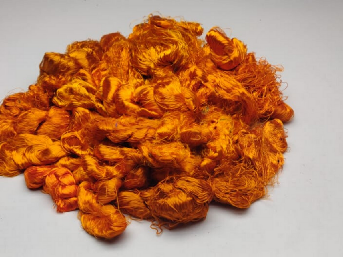 Banana viscose fiber in Orange, close-up of texture - silk-routeindia