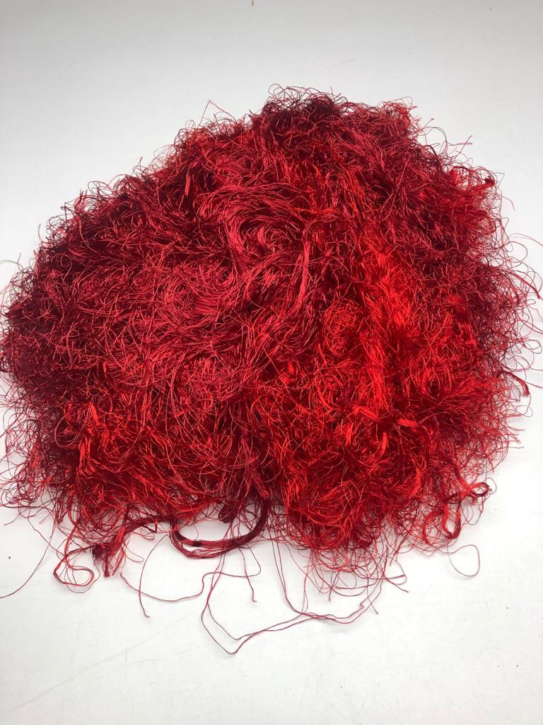 Banana viscose fiber in Maroon, skein on white background - silk-routeindia
