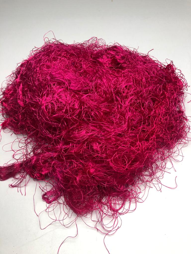 Banana viscose fiber in Hot Pink, skein on white background - silk-routeindia