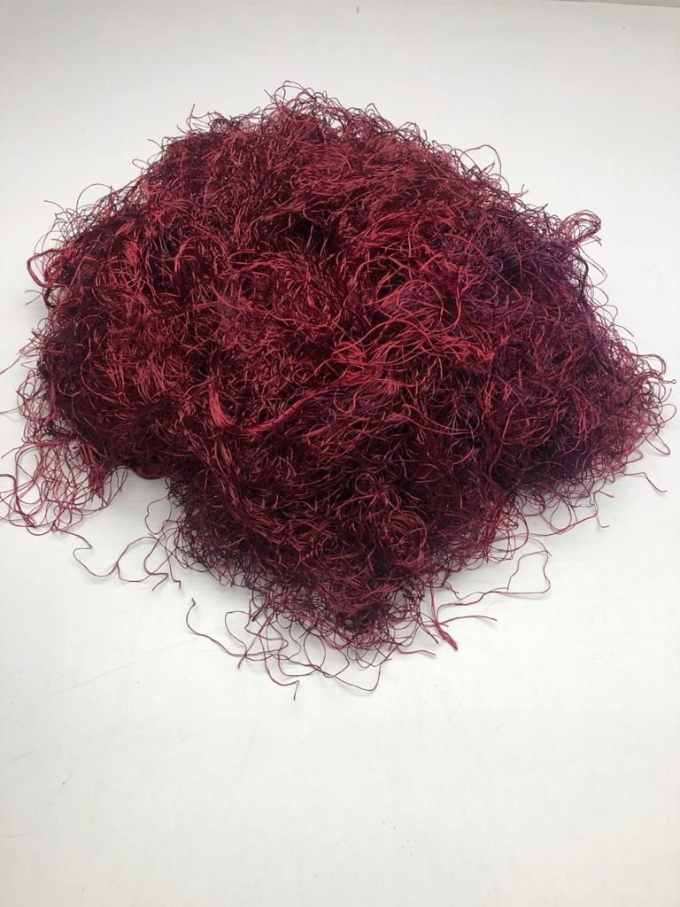 Banana viscose fiber in Hot Red, skein on white background - silk-routeindia