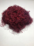 Banana viscose fiber in Hot Red, skein on white background - silk-routeindia