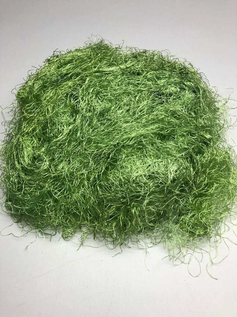 Banana viscose fiber in Light Green, skein on white background - silk-routeindia