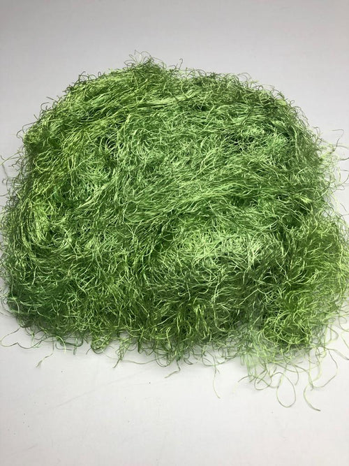 Banana viscose fiber in Light Green, skein on white background - silk-routeindia