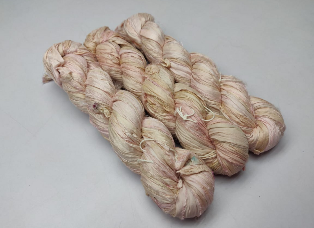 Recycled sari silk ribbon in Soft Amber, close-up of texture - silk-routeindia