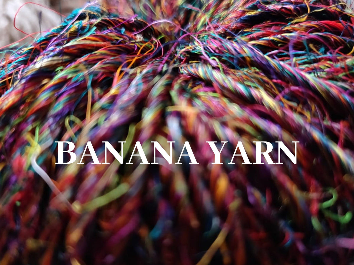 Banana yarn in Multicolor, skein on white background - silk-routeindia