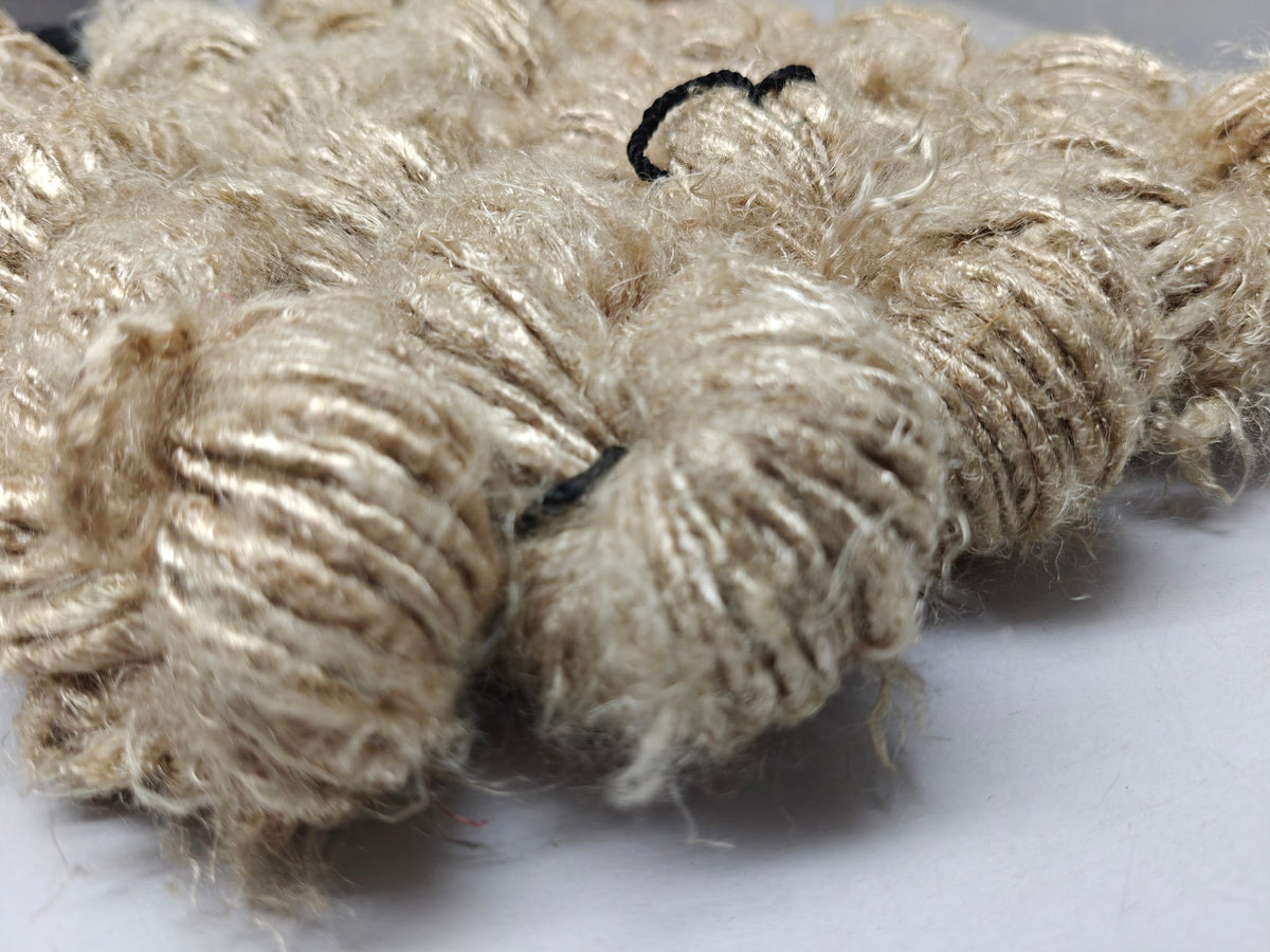 Banana yarn in Biscuit, skein on white background - silk-routeindia