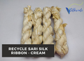 Recycled Sari silk Ribbon is the by-product of colorful saris that women wear in India.  The vibrant colors and unique texture of these silk fabric, the sari silk ribbons are inspirational to designers, knitters, and artisans.  recycled sari ribbon,  recycled sari silk ribbon yarn, recycled sari ribbon,  recycled ribbon, recycled silk,  recycled sari silk ribbon, ribbon yarn,  sari silk yarn, sari silk ribbon yarn,