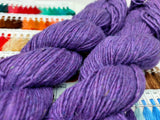 Noil Silk Yarn Purple - SilkRouteIndiaSilk Noil Yarn is made from the short fibers of the cocoon from combing of silk and is very soft in nature. This has alook of wool, feel of soft cotton and a luxury of Silk. Ideally used for Weaving, Knitting and Crocheting proje