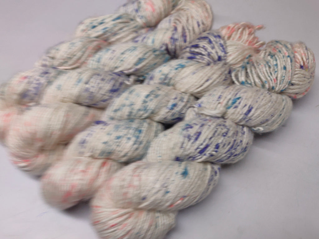 Mulberry Yarn Short Fiber - Indigo Strawberry - SilkRouteIndia Mulberry Silk Yarn Short Fiber is a unique Silk Yarn ideal for Knitting. Mulberry Yarn is very soft and shiny. It is DK weight and is directly spun from the short fiber of Mulberry Silk Tops. It is a yarn of Natural Protein Fiber. Mulberry Yarn has compact structure, evenness, clean appearance, elegant luster, Good moisture-absorbing capability, good strength and elongation, with fine and soft fibers. It is Useful for Weaving and Knitting