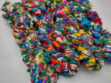 Recycled Yarn - Beng Tutti Frutti 3PLY is available in multitude of colors. We fabricate Recycled Sari Yarn from the bi-product of sari and silk production units. The Yarn, available with us, is hand spun into bright hanks which is suitable for number of Handicrafts applications.